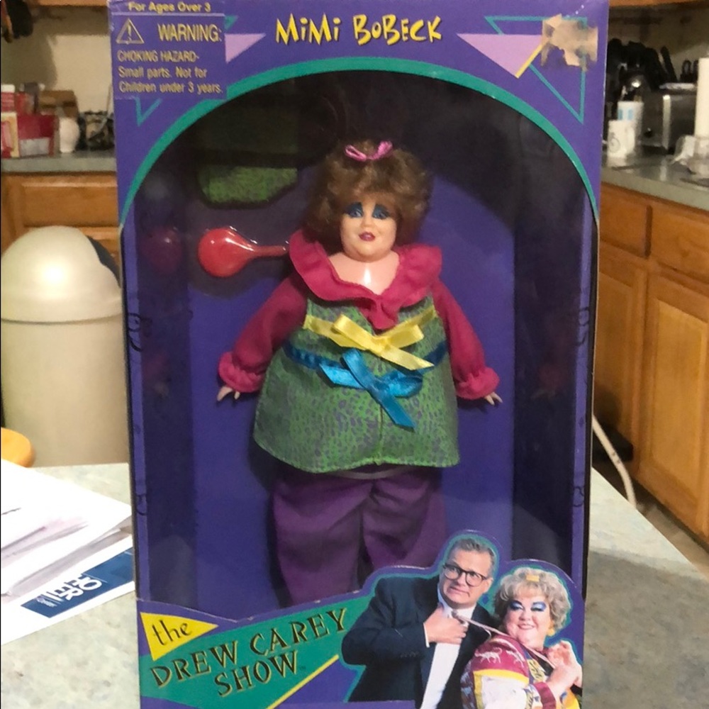 Unopened collector Drew Carey shoe doll